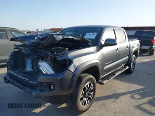 2023 Toyota Tacoma 4WD SR with VIN 3TMCZ5AN7PM587833, listed as a IAAI auction lot 41853887 with 16,532 mi miles. Bid and sale history available at carsss.com. Image 20.