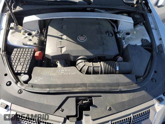 2010 Cadillac CTS Luxury z VIN 1G6DE5EG6A0118628, wystawiony jako Copart lot #52217455 z przebiegiem 138 733 mil mil oraz Szkoda całkowita • Salvage title. Historia ofert i sprzedaży dostępna na DreamBid. Obrazek 13.