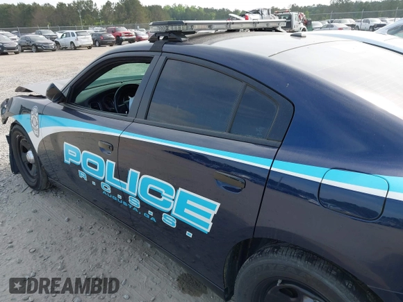 2021 Dodge Charger Police with VIN 2C3CDXAT6MH639895, listed as a IAAI auction lot 42104026 with 24,314 mi miles and . Bid and sale history available at DreamBid. Image 14.