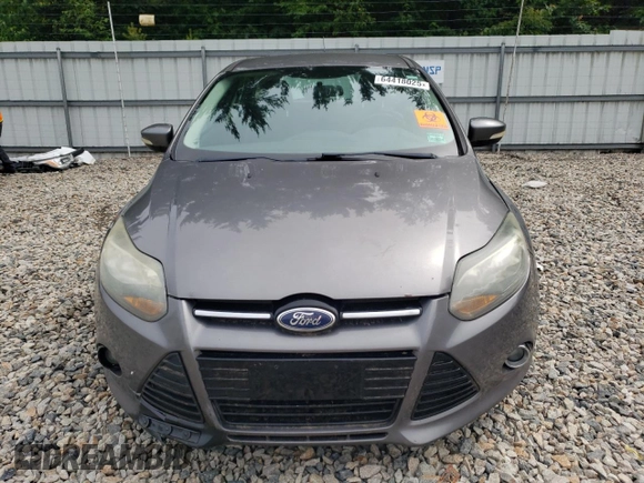 2014 Ford Focus Titanium z VIN 1FADP3N23EL365678, wystawiony jako Copart lot #64418025 z przebiegiem Nie podano mil oraz Czysty tytuł • Clean title. Historia ofert i sprzedaży dostępna na DreamBid. Obrazek 5.