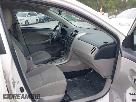 2012 Toyota Corolla L with VIN 2T1BU4EE7CC801818, listed as a IAAI auction lot 41906537 with 110,942 mi miles and . Bid and sale history available at DreamBid. Image 5.
