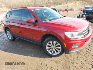 2018 Volkswagen Tiguan S z VIN 3VV1B7AX2JM050594, wystawiony jako IAAI lot #41681117 z przebiegiem 134 654 mil mil oraz . Historia ofert i sprzedaży dostępna na DreamBid. Obrazek 1.