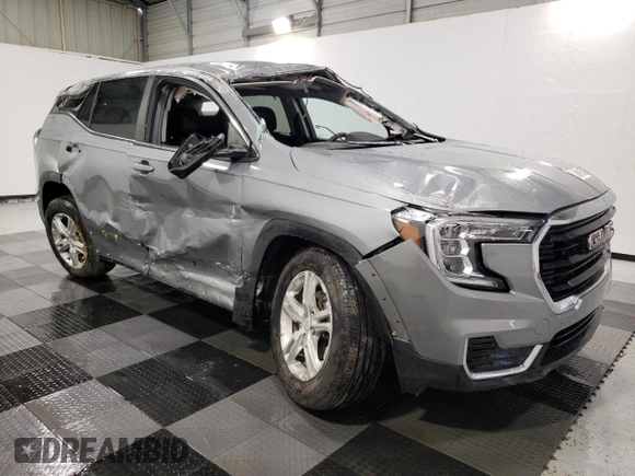2023 GMC Terrain SLE with VIN 3GKALMEGXPL210714, listed as a Copart auction lot 49721045 with 69,677 mi miles and Salvage Title. Bid and sale history available at DreamBid. Image 4.
