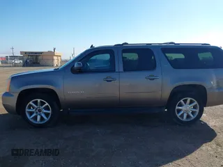 2012 GMC Yukon XL SLT with VIN 1GKS2KE73CR167820, listed as a IAAI auction lot 41462950 with 243,554 mi miles. Bid and sale history available at carsss.com. Image 14.