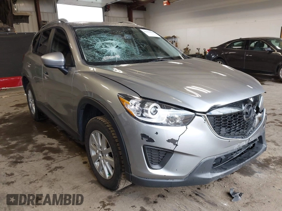 2015 Mazda CX-5 Sport z VIN JM3KE2BE8F0434889, wystawiony jako IAAI lot #42259894 z przebiegiem 298 835 mil mil oraz . Historia ofert i sprzedaży dostępna na DreamBid. Obrazek 1.