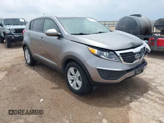 2013 Kia Sportage LX with VIN KNDPB3A22D7350575, listed as a IAAI auction lot 42396279 with 122,133 mi miles and . Bid and sale history available at DreamBid. Image 1.