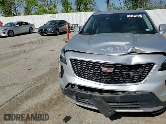 2019 Cadillac XT4 FWD Premium Luxury z VIN 1GYFZCR4XKF224734, wystawiony jako Copart lot #54141975 z przebiegiem 87 633 mil mil oraz Szkody całkowita. Historia ofert i sprzedaży dostępna na DreamBid. Obrazek 14.
