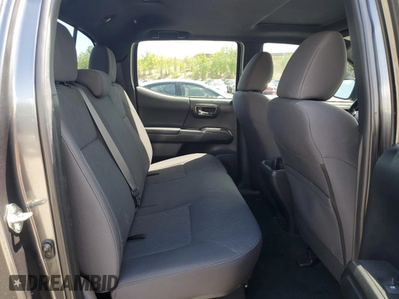 2017 Toyota Tacoma SR5 z VIN 3TMCZ5AN6HM060416, wystawiony jako Copart lot #56697175 z przebiegiem 120 029 mil mil oraz Szkoda całkowita • Salvage title. Historia ofert i sprzedaży dostępna na DreamBid. Obrazek 10.