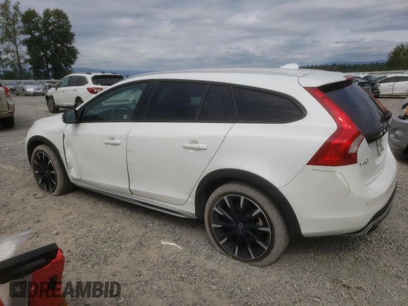 2018 Volvo V60 z VIN YV440MWK1J2051771, wystawiony jako Copart lot #67960674 z przebiegiem 49 782 mil mil oraz Szkoda całkowita • Salvage title. Historia ofert i sprzedaży dostępna na DreamBid. Obrazek 2.