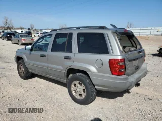 2002 Jeep Grand Cherokee with VIN 1J4GX38S82C178199, listed as a Copart auction lot 48996515 with 299,780 mi miles and Salvage title. Bid and sale history available at DreamBid. Image 2.