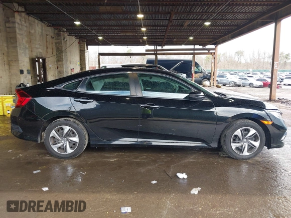 2020 Honda Civic LX z VIN 2HGFC2F61LH587612, wystawiony jako IAAI lot #41955072 z przebiegiem 89 476 mil mil oraz . Historia ofert i sprzedaży dostępna na DreamBid. Obrazek 13.