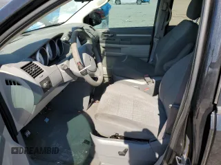 2010 Dodge Grand Caravan SE with VIN 2D4RN4DE2AR277815, listed as a Copart auction lot 50967125 with 148,006 mi miles and Clean Title. Bid and sale history available at DreamBid. Image 7.