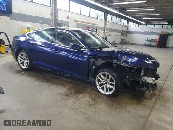 2023 Audi A5 Sportback S line Premium z VIN WAUDACF50PA054600, wystawiony jako Copart lot #56216885 z przebiegiem 23 802 mil mil oraz Szkoda całkowita • Salvage title. Historia ofert i sprzedaży dostępna na DreamBid. Obrazek 4.