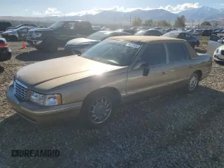 1999 Cadillac DeVille DHS z VIN 1G6KE54Y5XU721363, wystawiony jako Copart lot #79227924 z przebiegiem Nie podano mil oraz Szkoda całkowita • Salvage title. Historia ofert i sprzedaży dostępna na DreamBid. Obrazek 1.