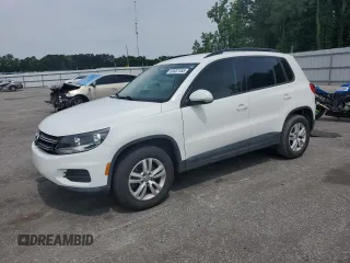 2017 Volkswagen Tiguan S with VIN WVGAV7AX7HK017576, listed as a Copart auction lot 58487455 with 100,034 mi miles and Salvage title. Bid and sale history available at DreamBid. Image 1.