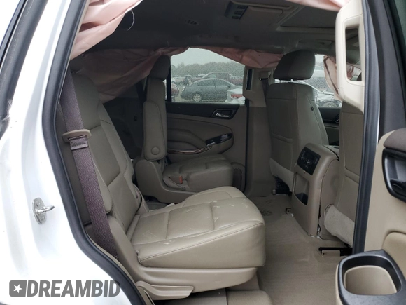 2019 GMC Yukon SLT with VIN 1GKS2BKC2KR338007, listed as a Copart auction lot 82336394 with 105,087 mi miles and Salvage Title. Bid and sale history available at carsss.com. Image 11.