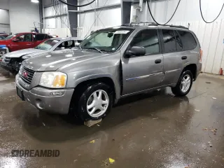 2006 GMC Envoy SLT with VIN 1GKDT13S362157924, listed as a Copart auction lot 79403154 with 99,055 mi miles and Salvage Title. Bid and sale history available at carsss.com. Image 1.