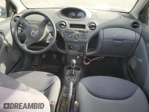 2005 Toyota ECHO z VIN JTDKT123450094307, wystawiony jako Copart lot #76727444 z przebiegiem Nie podano mil oraz Czysty tytuł • Clean title. Historia ofert i sprzedaży dostępna na DreamBid. Obrazek 8.