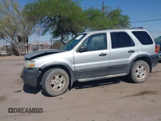2006 Ford Escape XLT z VIN 1FMCU93136KC15231, wystawiony jako IAAI lot #42625410 z przebiegiem 117 479 mil mil oraz . Historia ofert i sprzedaży dostępna na DreamBid. Obrazek 12.