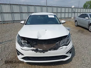 2020 Kia Optima LX with VIN 5XXGT4L31LG381346, listed as a IAAI auction lot 42044720 with 145,726 mi miles and . Bid and sale history available at DreamBid. Image 13.