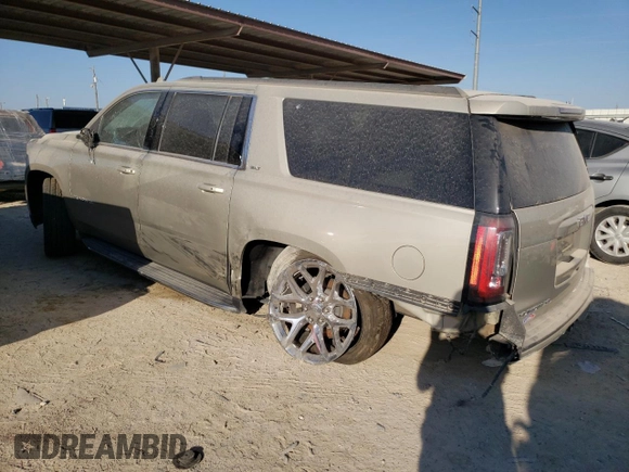 2017 GMC Yukon XL SLT with VIN 1GKS1GKC8HR244920, listed as a Copart auction lot 74199764 with 151,777 mi miles and Salvage Title. Bid and sale history available at DreamBid. Image 2.