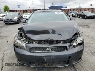 2007 Scion tC Spec z VIN JTKDE167670203703, wystawiony jako Copart lot #56007245 z przebiegiem Nie podano mil oraz Szkoda całkowita • Salvage title. Historia ofert i sprzedaży dostępna na DreamBid. Obrazek 5.