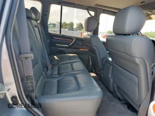 2001 Lexus LX 470 z VIN JTJHT00W313504330, wystawiony jako Copart lot #61126435 z przebiegiem 87 049 mil mil oraz Czysty tytuł • Clean title. Historia ofert i sprzedaży dostępna na DreamBid. Obrazek 11.
