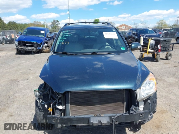 2010 Toyota RAV4 Ltd with VIN JTMDF4DV9AD030220, listed as a IAAI auction lot 42009077 with 182,176 mi miles. Bid and sale history available at carsss.com. Image 13.