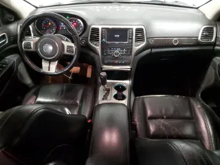2011 Jeep Grand Cherokee Laredo z VIN 1J4RR4GGXBC609891, wystawiony jako Copart lot #52089645 z przebiegiem 180 895 mil mil oraz Szkoda całkowita • Salvage title. Historia ofert i sprzedaży dostępna na DreamBid. Obrazek 8.