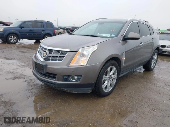 2011 Cadillac SRX Premium Collection with VIN 3GYFNFEY3BS610591, listed as a IAAI auction lot 41446148 with 147,959 mi miles. Bid and sale history available at carsss.com. Image 2.