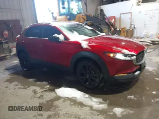 2022 Mazda CX-30 2.5 Turbo with VIN 3MVDMBAY5NM427943, listed as a IAAI auction lot 41585519 with 32,807 mi miles and . Bid and sale history available at carsss.com. Image 1.