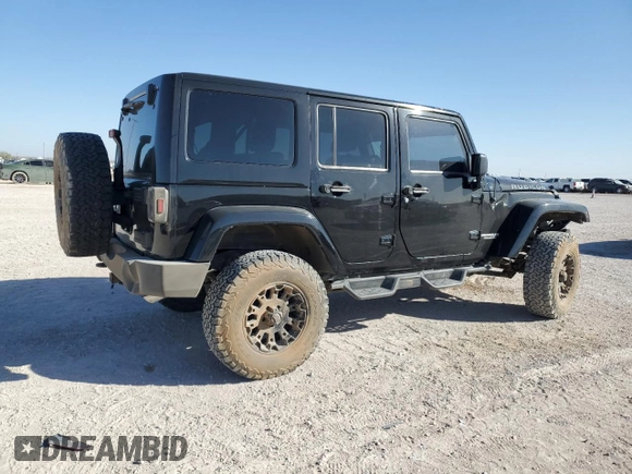 2012 Jeep Wrangler Unlimited Rubicon z VIN 1C4HJWFG9CL105047, wystawiony jako Copart lot #49494005 z przebiegiem 132 591 mil mil oraz Szkoda całkowita • Salvage title. Historia ofert i sprzedaży dostępna na DreamBid. Obrazek 3.