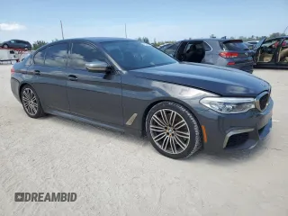 2019 BMW 5 Series M550i xDrive with VIN WBAJB9C56KB288993, listed as a Copart auction lot 57566415 with Not provided miles and Non repairable. Bid and sale history available at DreamBid. Image 4.