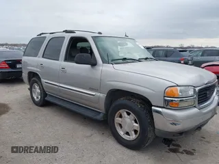 2004 GMC Yukon SLE z VIN 1GKEC13Z54J265434, wystawiony jako IAAI lot #41155633 z przebiegiem 331 908 mil mil oraz . Historia ofert i sprzedaży dostępna na DreamBid. Obrazek 1.