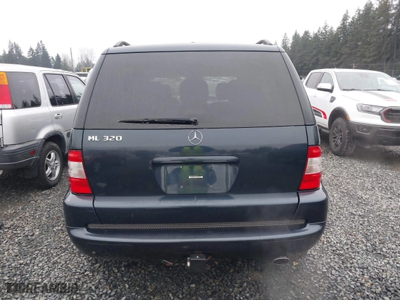 2002 Mercedes-Benz M-Class with VIN 4JGAB54E72A296354, listed as a IAAI auction lot 41277897 with 101,842 mi miles. Bid and sale history available at carsss.com. Image 16.