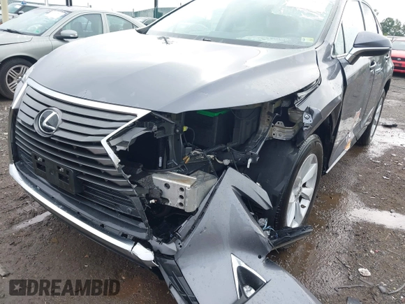 2016 Lexus RX 350 z VIN 2T2BZMCA5GC052214, wystawiony jako IAAI lot #42669843 z przebiegiem 93 891 mil mil oraz . Historia ofert i sprzedaży dostępna na DreamBid. Obrazek 6.