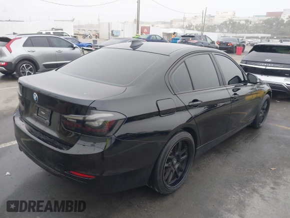 2014 BMW 3 Series 320i with VIN WBA3B1C59EK130839, listed as a IAAI auction lot 41225364 with 131,312 mi miles. Bid and sale history available at carsss.com. Image 4.
