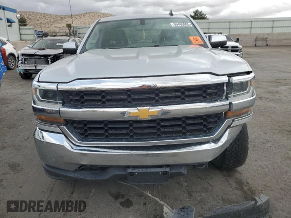 2018 Chevrolet Silverado 1500 LT with VIN 1GCVKREC2JZ180747, listed as a Copart auction lot 50405905 with 131,772 mi miles and Salvage Title. Bid and sale history available at DreamBid. Image 5.