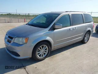 2014 Dodge Grand Caravan SXT z VIN 2C4RDGCG4ER244762, wystawiony jako IAAI lot #42002269 z przebiegiem 117 896 mil mil oraz . Historia ofert i sprzedaży dostępna na DreamBid. Obrazek 2.