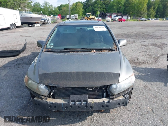 2007 Honda Civic Si z VIN 2HGFG21517H705635, wystawiony jako IAAI lot #42379678 z przebiegiem 231 174 mil mil oraz . Historia ofert i sprzedaży dostępna na DreamBid. Obrazek 6.