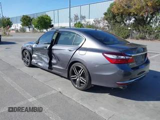 2017 Honda Accord Touring with VIN 1HGCR3F97HA030310, listed as a IAAI auction lot 42539852 with 64,849 mi miles and . Bid and sale history available at DreamBid. Image 3.