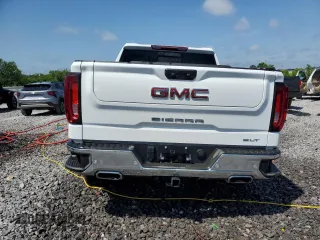 2024 GMC Sierra 1500 SLT with VIN 3GTUUDED3RG344150, listed as a Copart auction lot 56989275 with 15,315 mi miles and Salvage title. Bid and sale history available at DreamBid. Image 6.