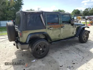 2008 Jeep Wrangler Unlimited X with VIN 1J4GA39118L633877, listed as a Copart auction lot 63652795 with 129,856 mi miles and Clean title. Bid and sale history available at DreamBid. Image 3.