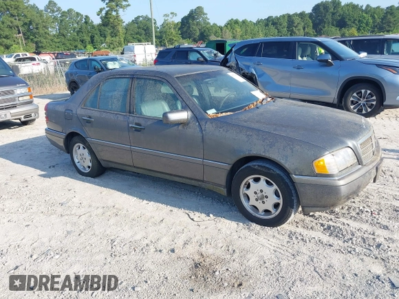 1997 Mercedes-Benz C with VIN WDBHA28E7VA496104, listed as a IAAI auction lot 42773052 with 258,692 mi miles and . Bid and sale history available at DreamBid. Image 1.