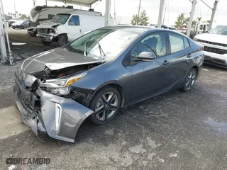 2022 Toyota Prius L Eco with VIN JTDKAMFU7N3155268, listed as a IAAI auction lot 41589024 with 158,430 mi miles. Bid and sale history available at carsss.com. Image 17.