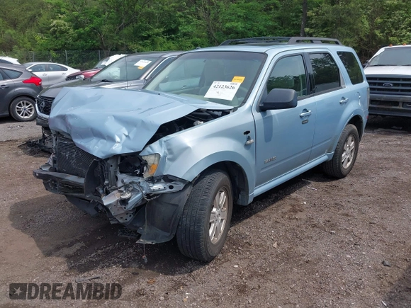 2008 Mercury Mariner with VIN 4M2CU81178KJ28804, listed as a IAAI auction lot 42123626 with 168,134 mi miles and . Bid and sale history available at DreamBid. Image 2.
