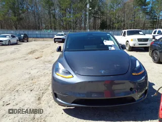 2022 Tesla Model Y Performance with VIN 7SAYGDEF9NF544205, listed as a IAAI auction lot 41825453 with 33,039 mi miles and . Bid and sale history available at DreamBid. Image 12.