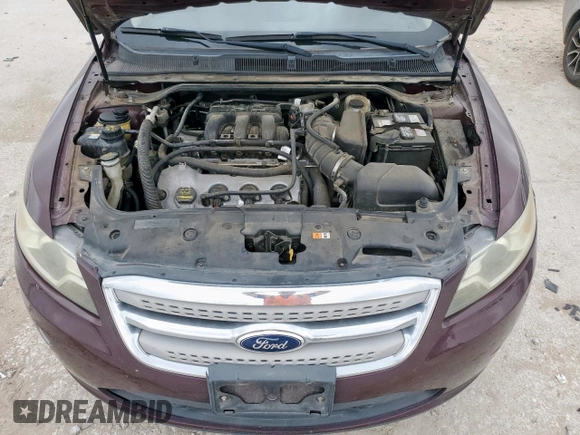 2011 Ford Taurus SEL z VIN 1FAHP2EW6BG183640, wystawiony jako Copart lot #54662745 z przebiegiem 149 309 mil mil oraz Szkoda całkowita • Salvage title. Historia ofert i sprzedaży dostępna na DreamBid. Obrazek 11.