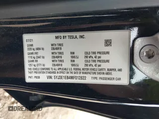 2021 Tesla Model 3 Long Range with VIN 5YJ3E1EB4MF012822, listed as a IAAI auction lot 41918721 with 69,105 mi miles. Bid and sale history available at carsss.com. Image 9.