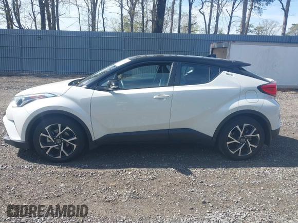 2019 Toyota C-HR XLE with VIN NMTKHMBX5KR097682, listed as a IAAI auction lot 42145372 with 11,003 mi miles and . Bid and sale history available at DreamBid. Image 14.